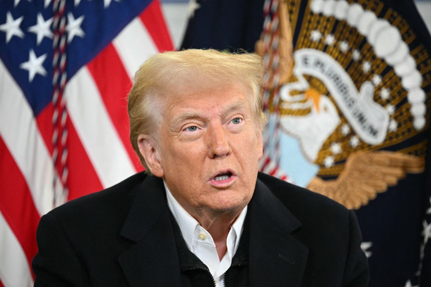 US President Donald Trump speaks at a press briefing