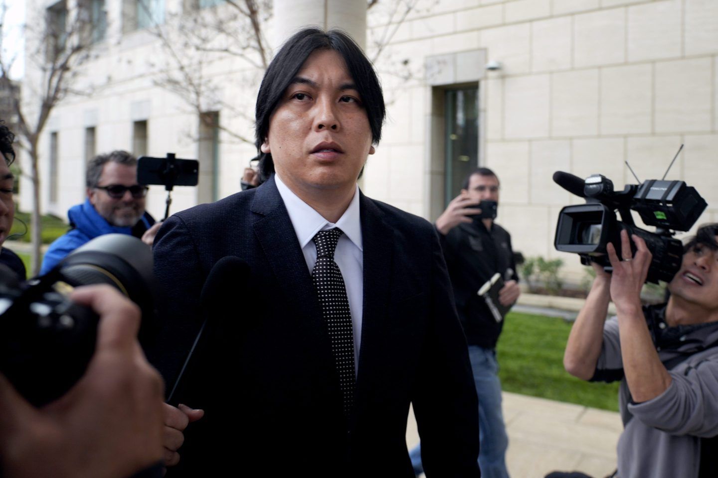 Ippei Mizuhara, former interpreter for Los Angeles Dodgers baseball star Shohei Ohtani expected to be sentenced for bank and tax fraud arrives at federal court on Feb. 6, 2025, in Santa Ana, Calif.