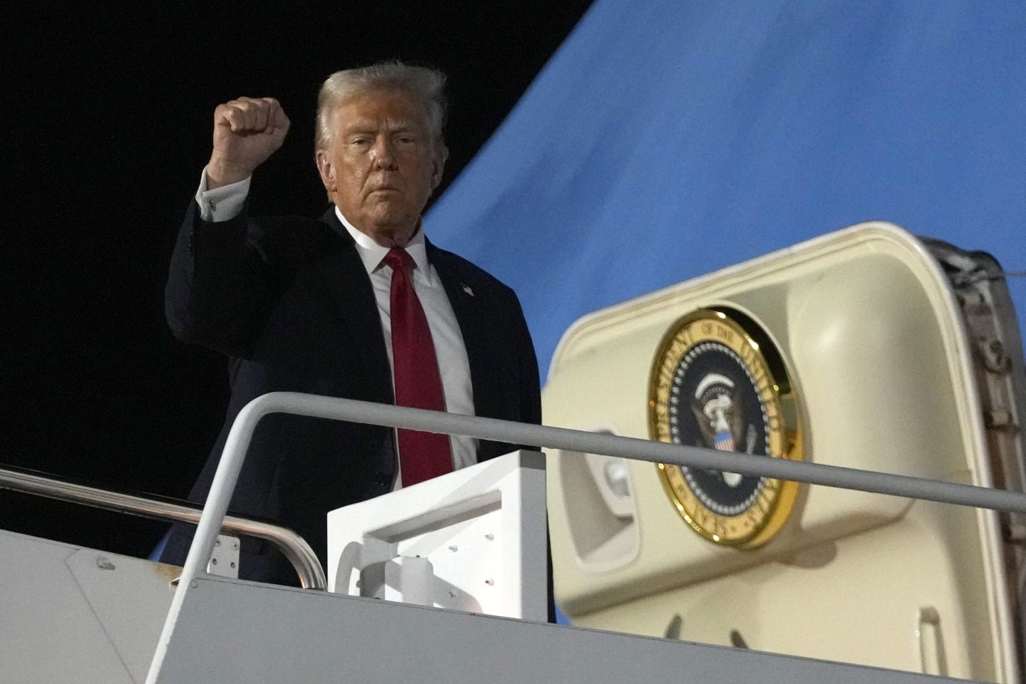 President Donald Trump boards Air Force One at the Naval Air Station Joint Reserve Base in New Orleans, on Feb. 9, 2025. 