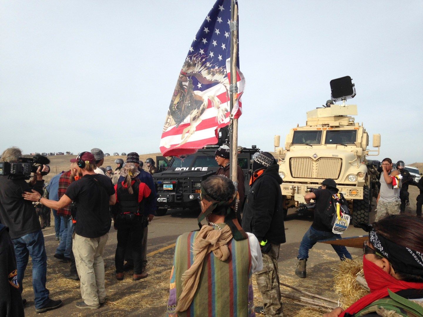 Dakota Access pipeline protesters defy law enforcement officers who are trying to force them from a camp on private land in the path of pipeline construction, Oct. 27, 2016, near Cannon Ball, N.D.  