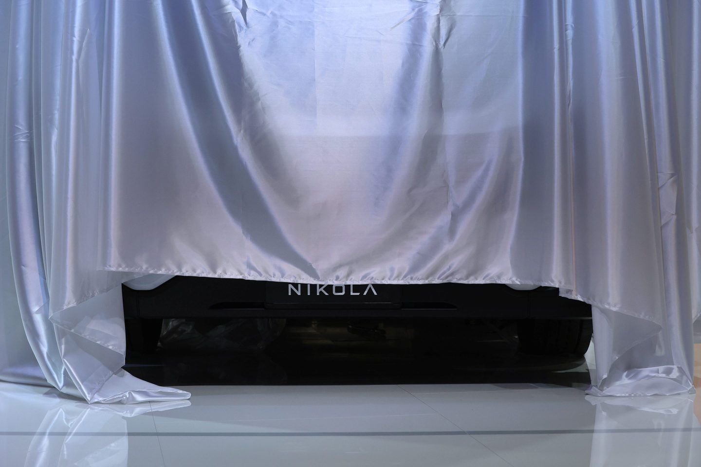 A sheet is draped over a Nikola truck