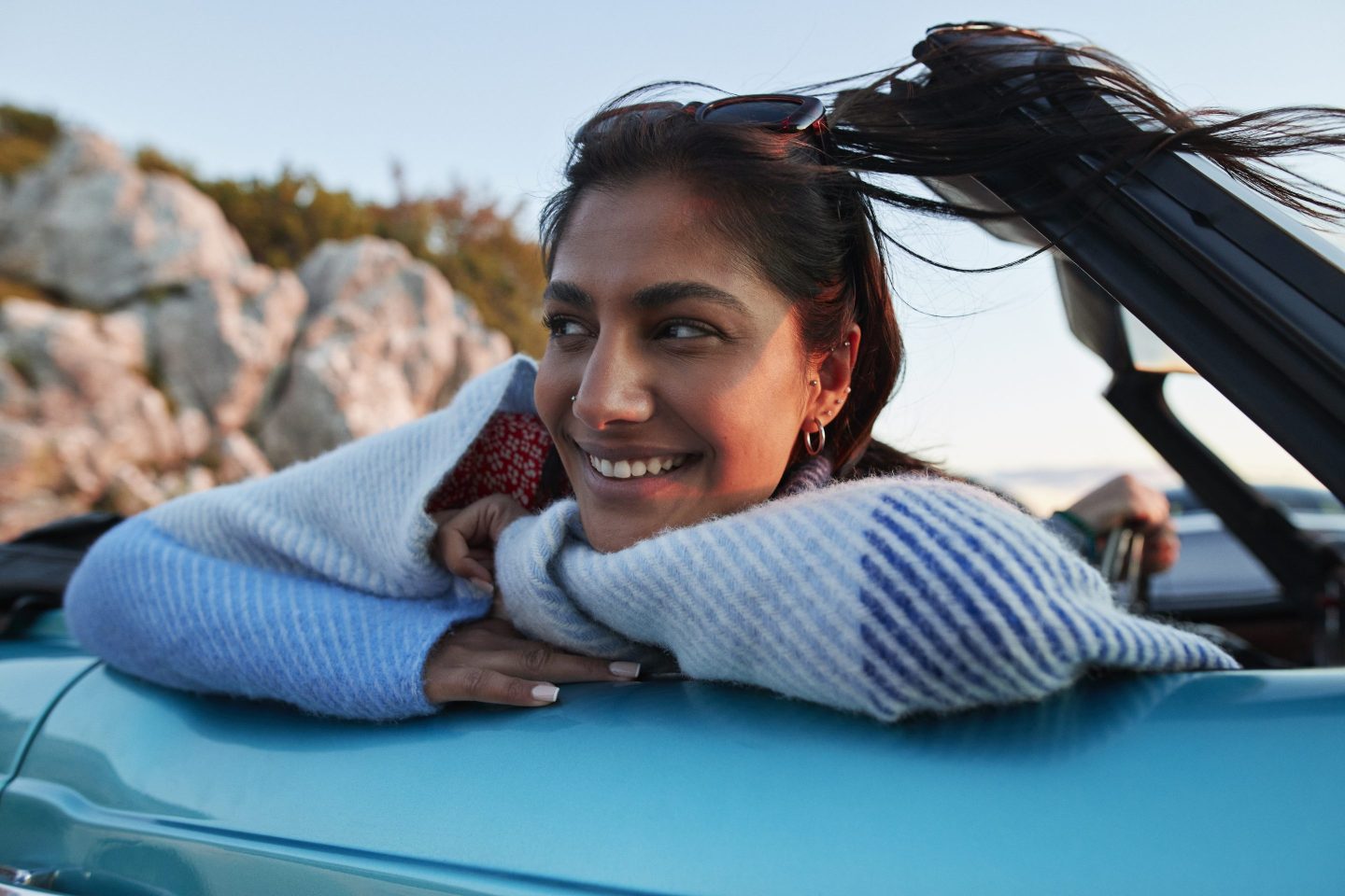 Young woman enjoying a road trip
