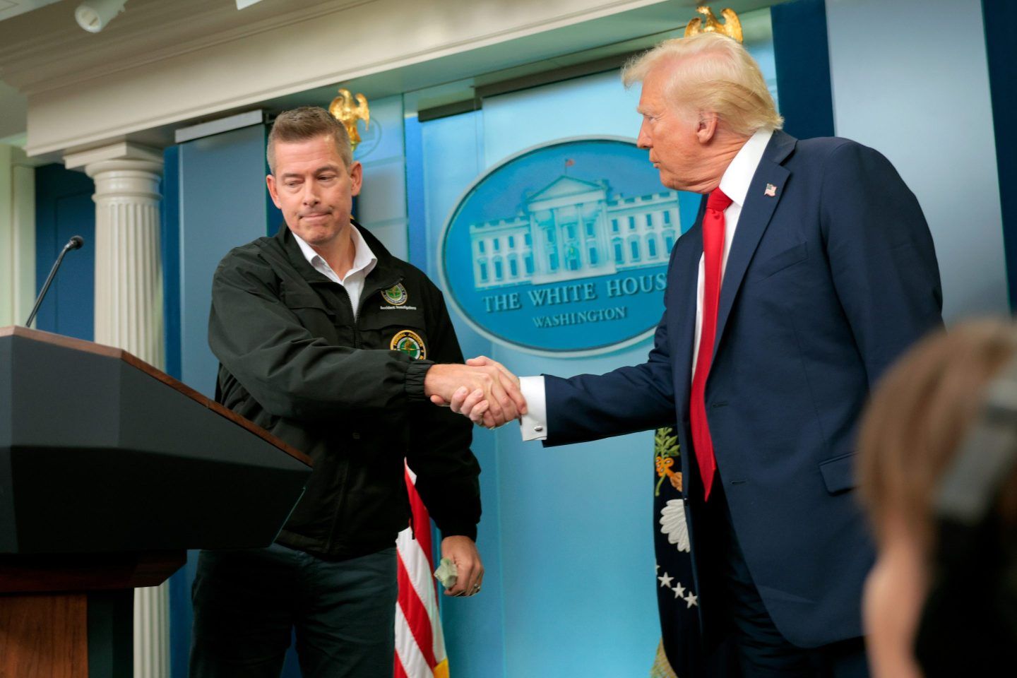 Donald Trump shakes hands with Sean Duffy (left)