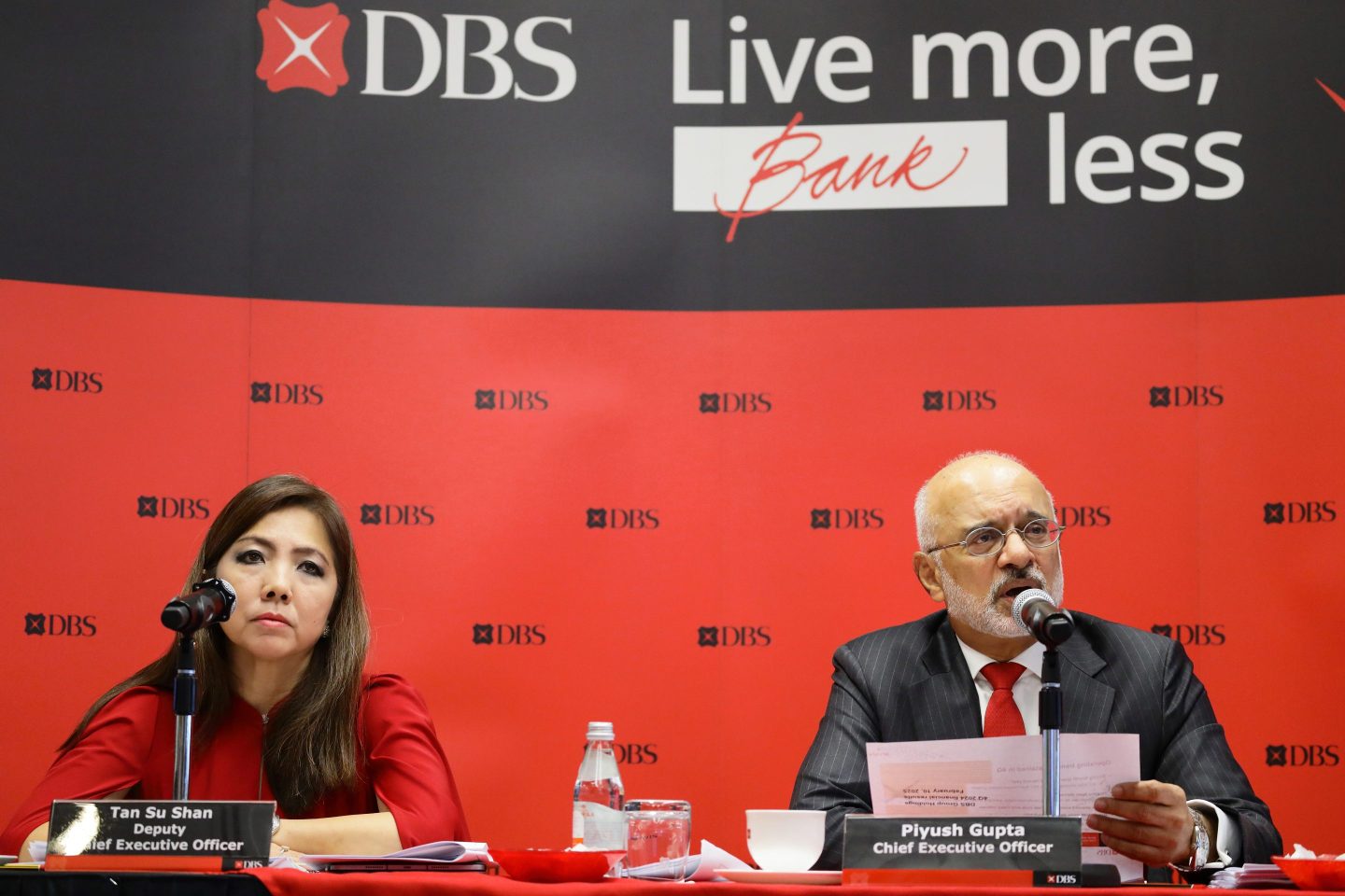 Tan Su Shan (left), deputy CEO of DBS, and Piyush Gupta, CEO, during a news conference in Singapore on Feb. 10, 2025.