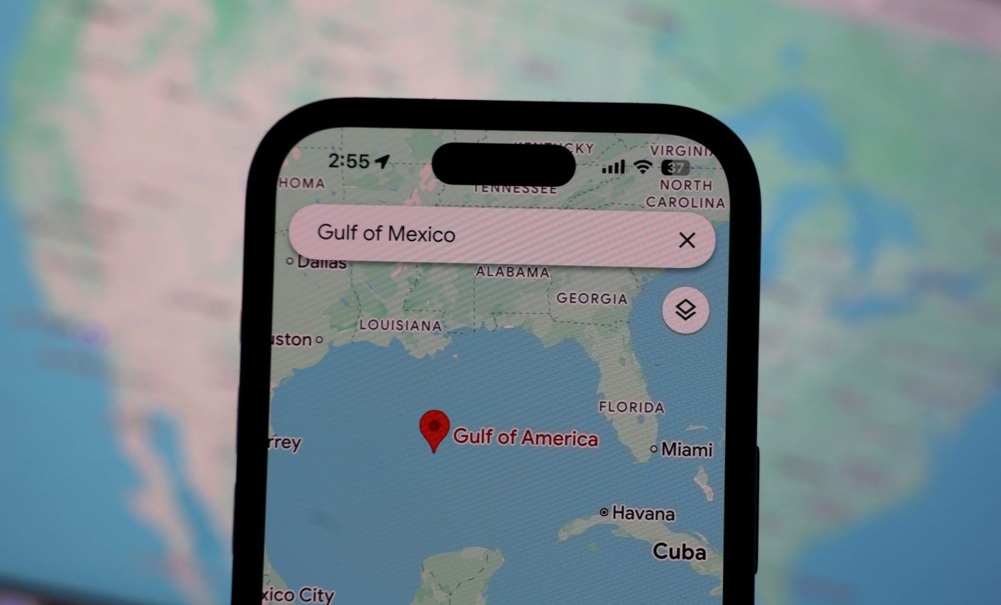 A phone using Google Maps searches for "Gulf of Mexico," but the map returns "Gulf of America"