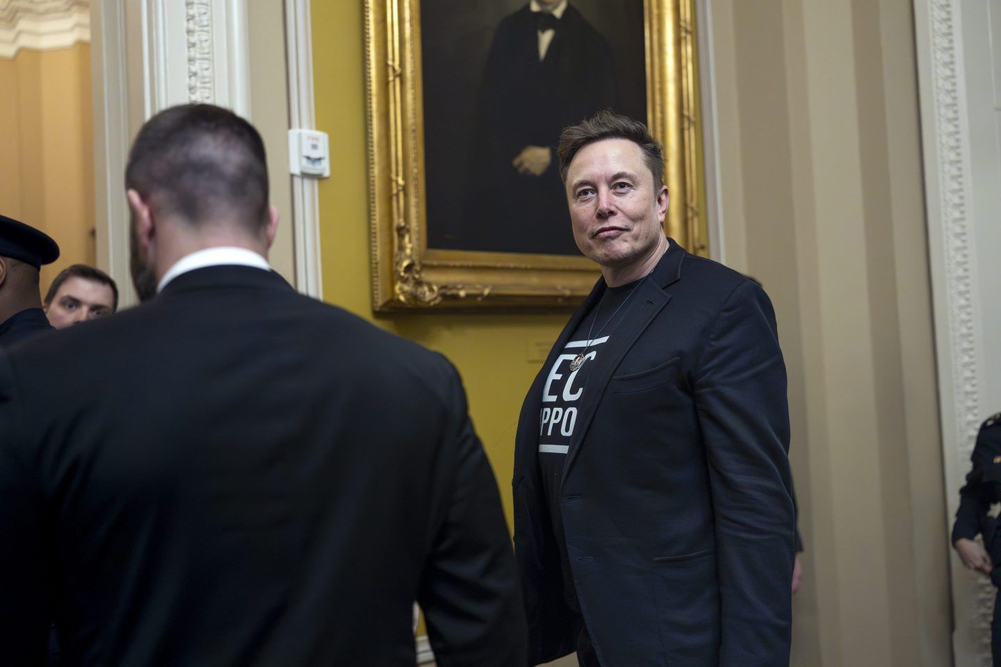 Elon Musk departs the Capitol following a meeting with Senate Republicans, in Washington, on March 5, 2025.