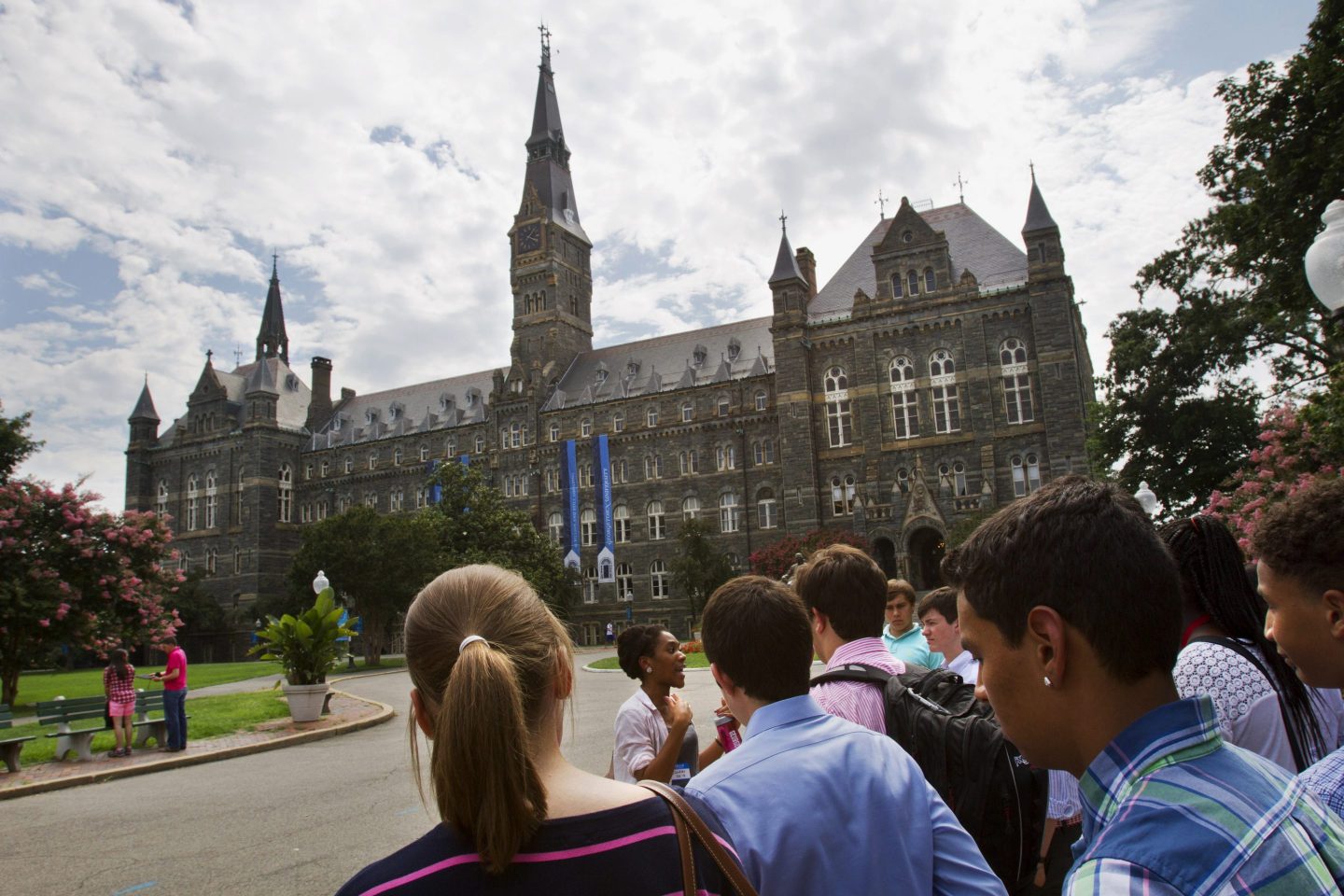 Prospective students tour Georgetown University's campus in Washington on July 10, 2013.