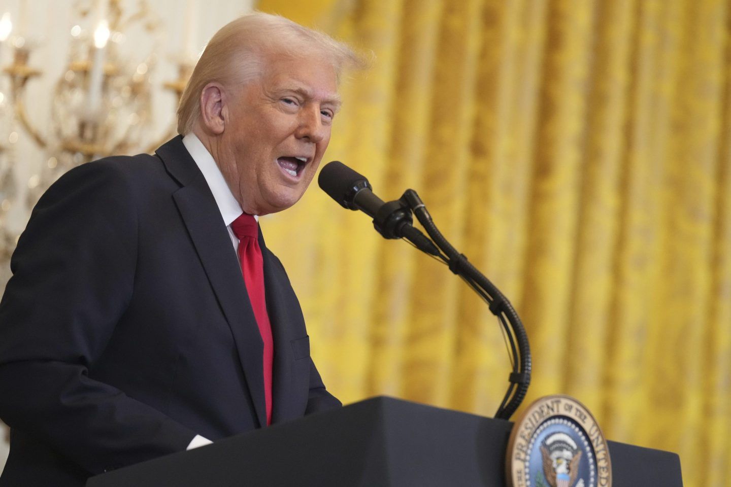 President Donald Trump speaks at a reception celebrating Women's History Month in the East Room of the White House, on March 26, 2025, in Washington.