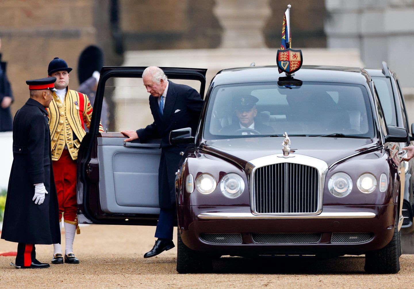 King Charles III is greeted by Sir Kenneth Olisa, Lord-Lieutenant of Greater London as he arrives, in his chauffeur driven Bentley State Limousine, to attend a ceremonial welcome, at Horse Guards Parade, for the President and the First Lady of the Republic of Korea on day 1 of their state visit on November 21, 2023 in London, England. King Charles is hosting Korean President Yoon Suk Yeol and his wife Kim Keon Hee on a state visit from November 21-23. It is the second incoming state visit hosted by the King during his reign.