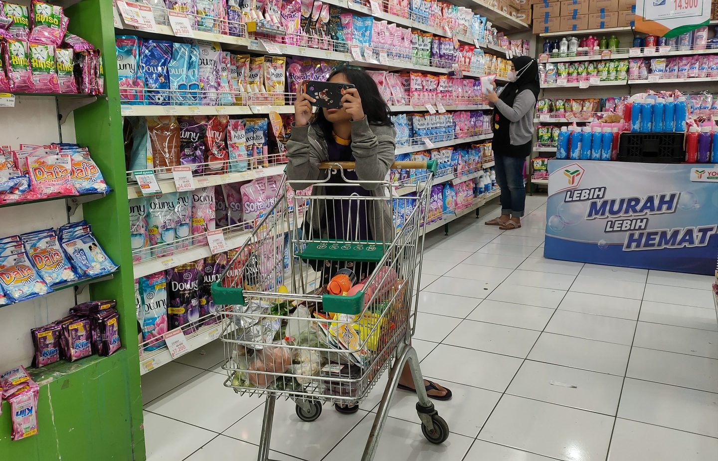 A woman is shopping at a supermarket in Bogor, West Java, Indonesia, on March 3, 2024.