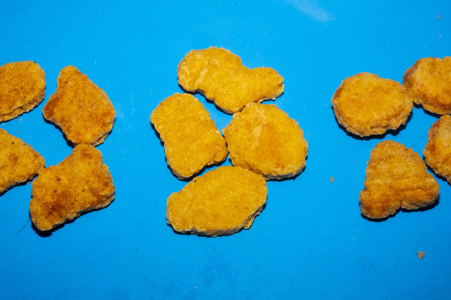 Chicken nuggets on a blue table