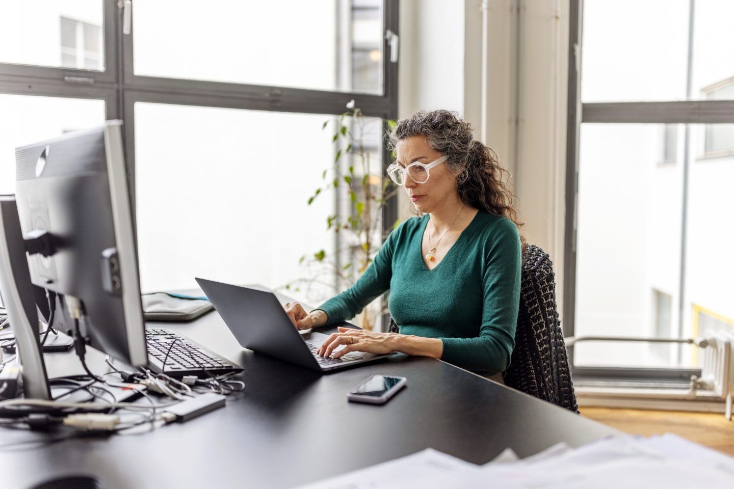 Exhaustion, headaches and other elements of menopause can lead to lost wages, researchers have found.