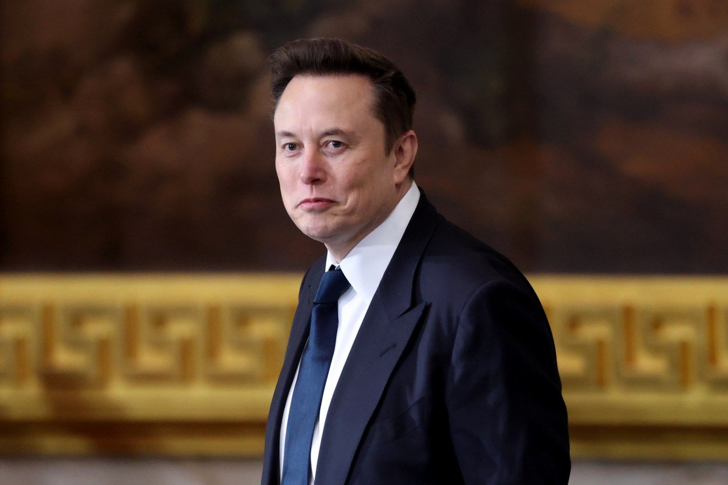 Elon Musk sought to reassure Tesla employees through what he referred to as “a little bit of stormy weather,” after the carmaker’s shares plunged more than 50% in just three months.