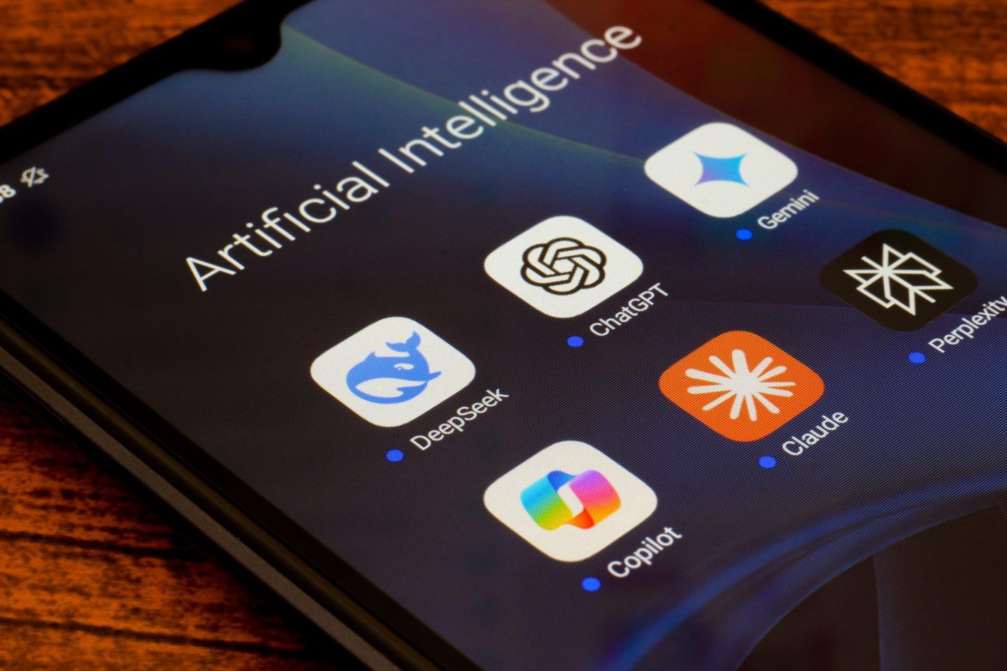 In this photo illustration, the artificial intelligence (AI) apps DeepSeek, ChatGPT, Google Gemini, Copilot, Claude, and Perplexity seen displayed on a smartphone.