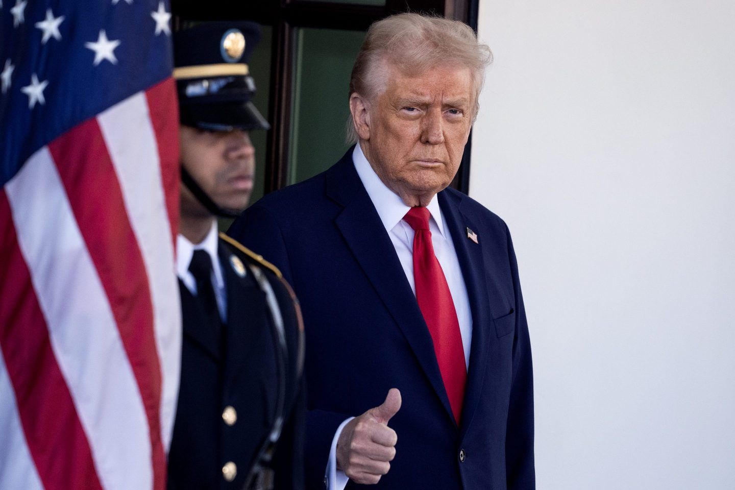Donald Trump gives the camera a thumbs up in front of the White House on Feb. 28.