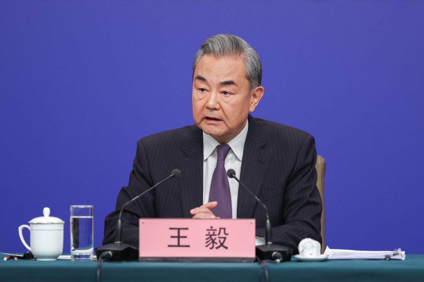 “No country should fantasize that it can suppress China, and maintain good relations with China at the same time,” foreign minister Wang Yi told journalists on Friday.