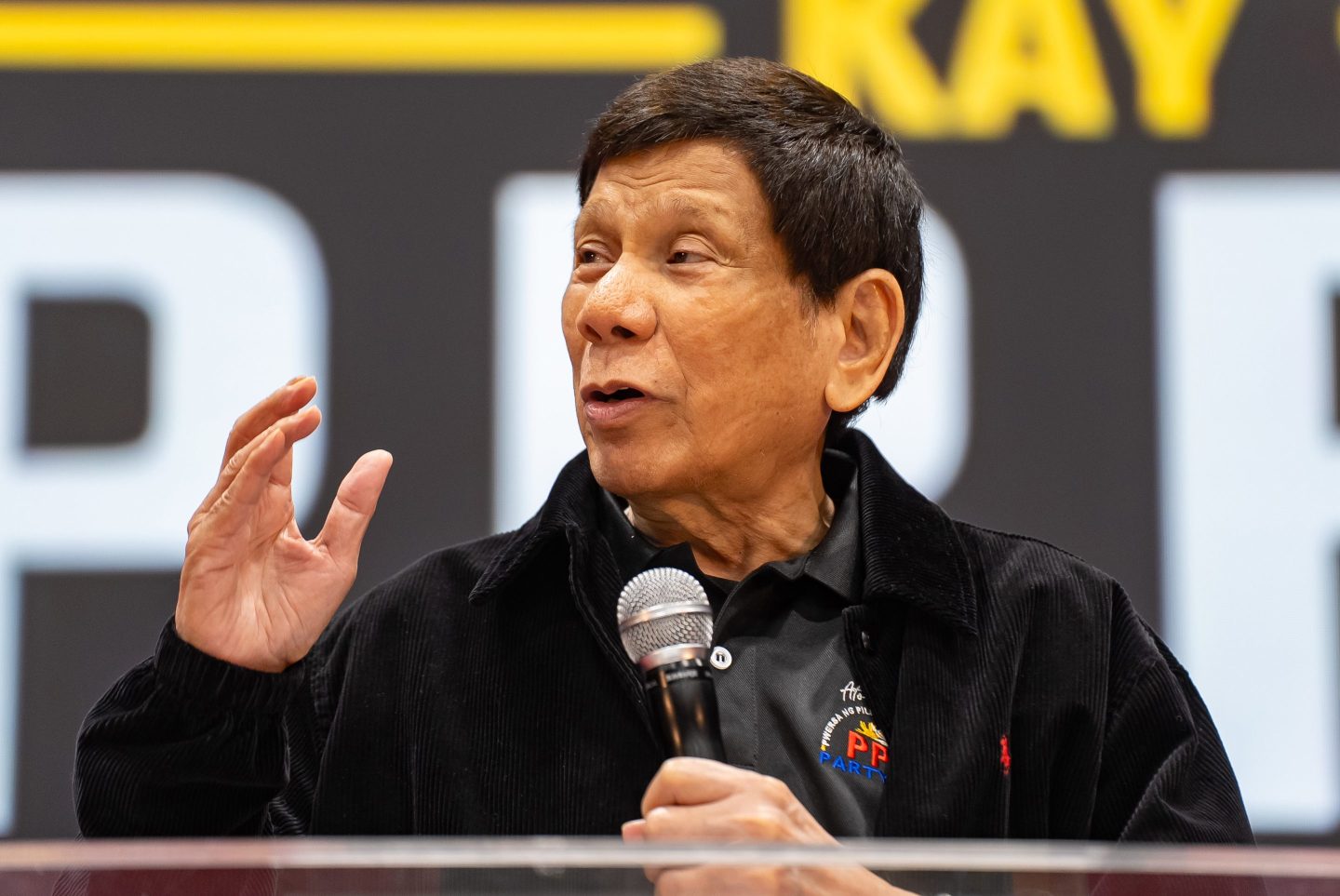 Speaking to thousands of overseas Filipino workers in Hong Kong on Sunday, the former president decried the investigation yet said he would "accept" an arrest.