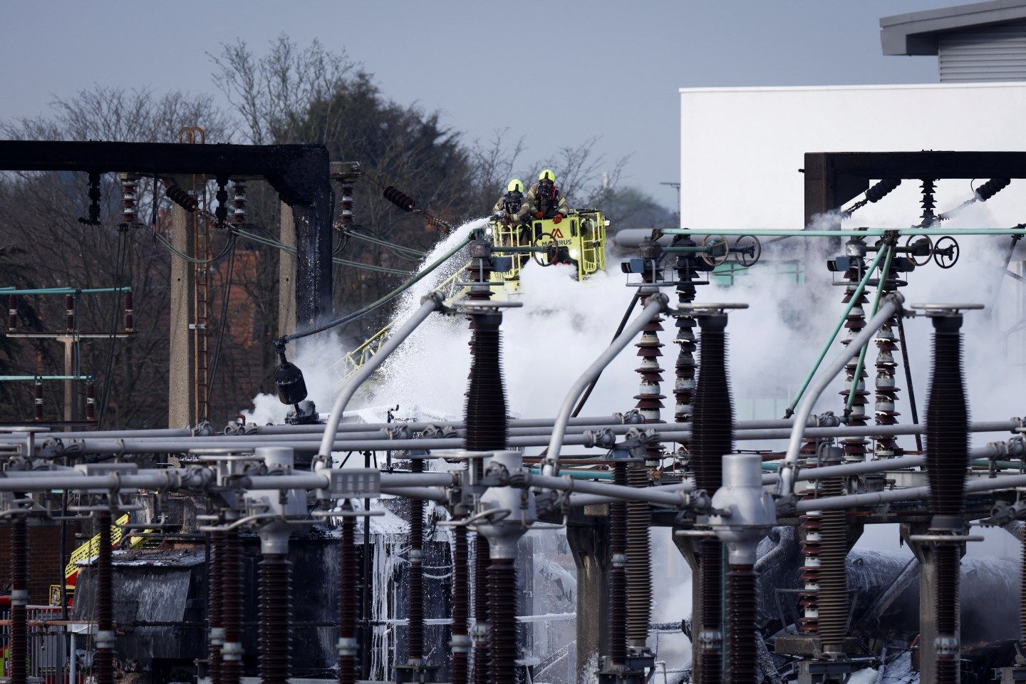 Firefighters at the North Hyde electrical substation which caught fire. More than 1,300 flights to and from Heathrow Airport will be disrupted on Friday due to the closure of the airport following the fire. Picture date: Friday March 21, 2025. (Photo by Jonathan Brady/PA Images via Getty Images)