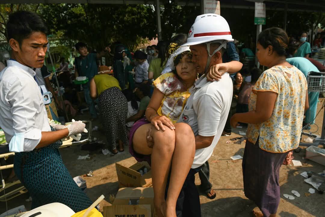 Myanmar Red Cross Society workers transport an earthquake casualty in the compound of a hospital in Naypyidaw, Myanmar on March 28, 2025.