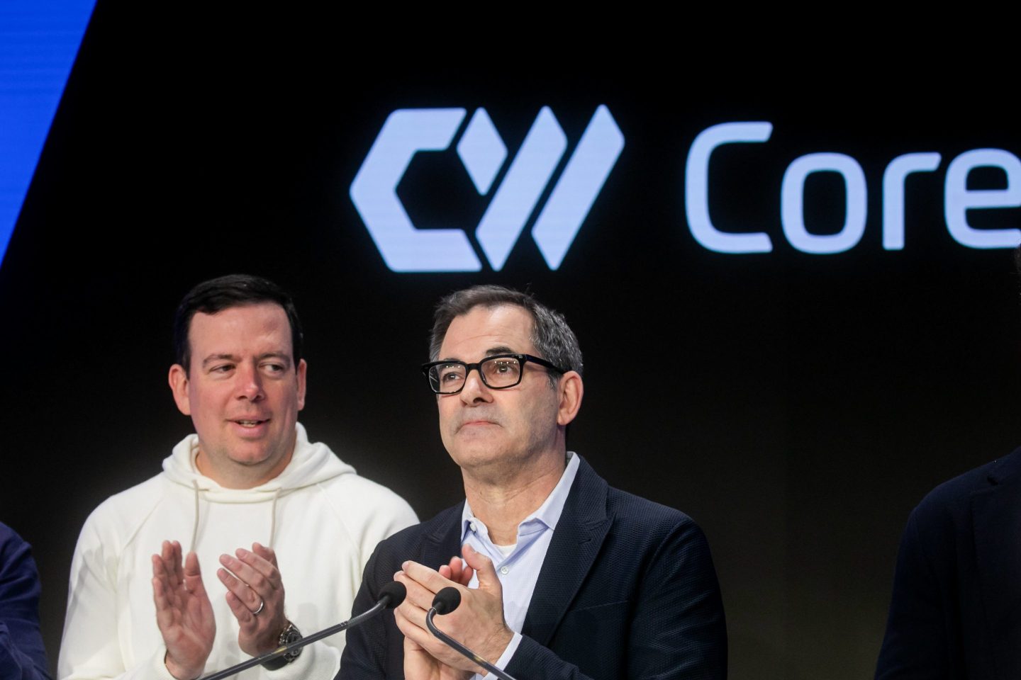 Michael Intrator, co-founder and chief executive officer of CoreWeave Inc., right, during the company's initial public offering at the Nasdaq MarketSite in New York, US, on Friday, March 28, 2025. 