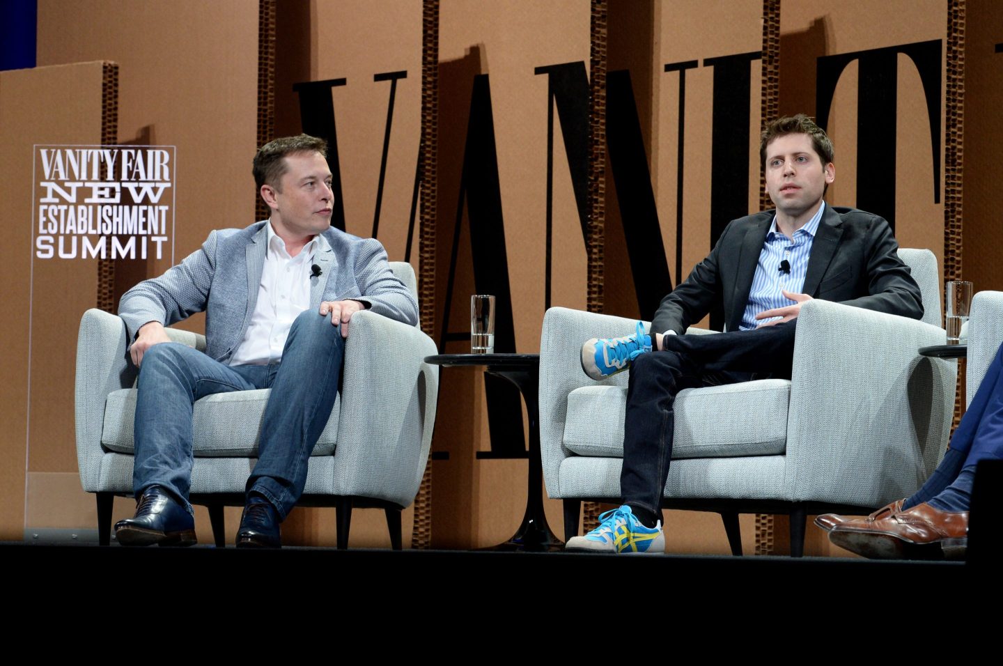 Elon Musk and Sam Altman on-stage together at a 2015 conference.