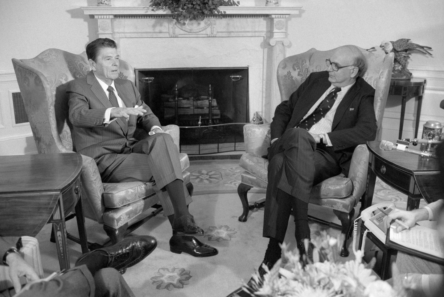 Former president Ronald Reagan sits with former Fed Chair Paul Volcker in 1981.