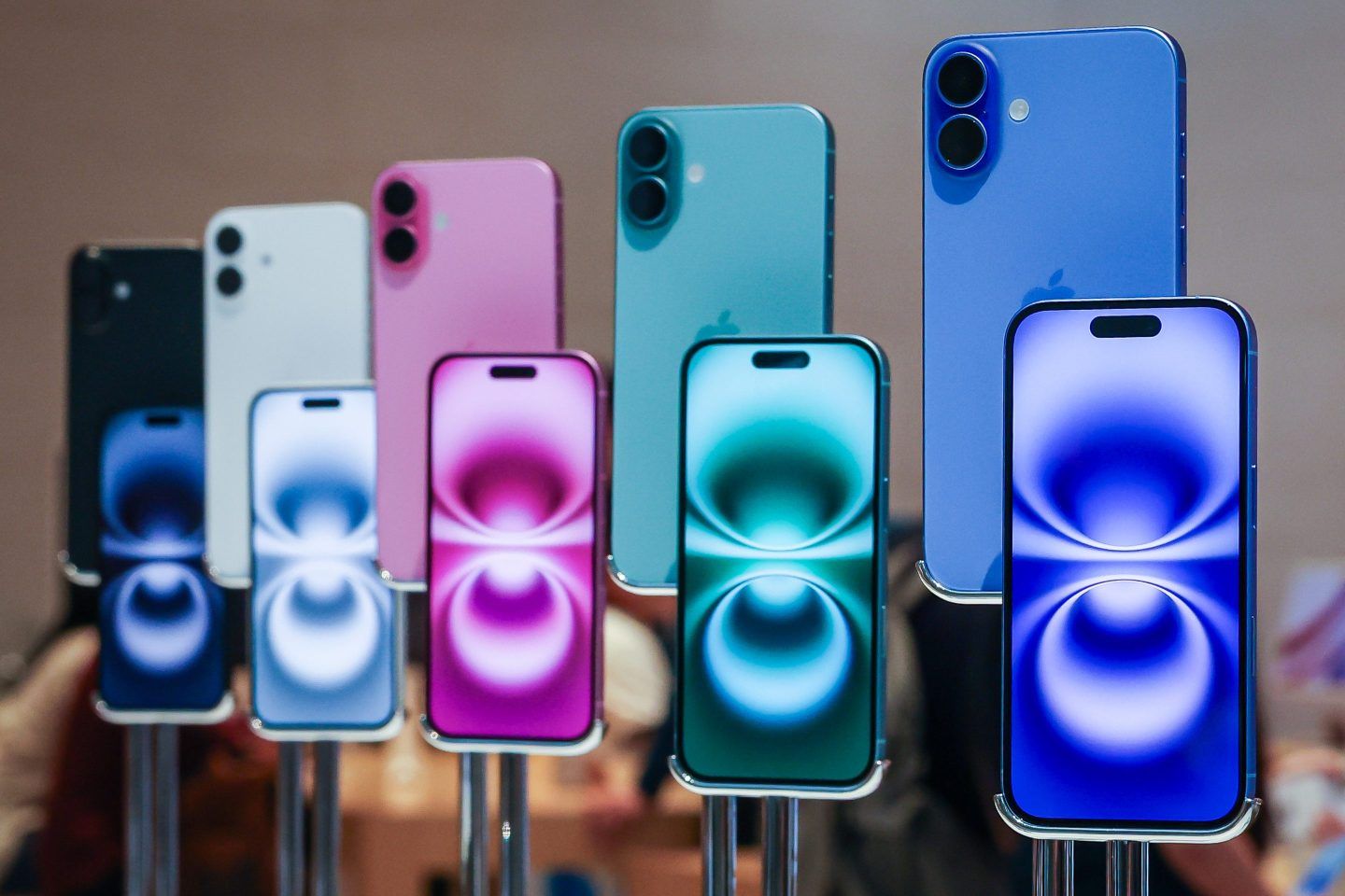 Colorful iPhones displayed at an Apple Store