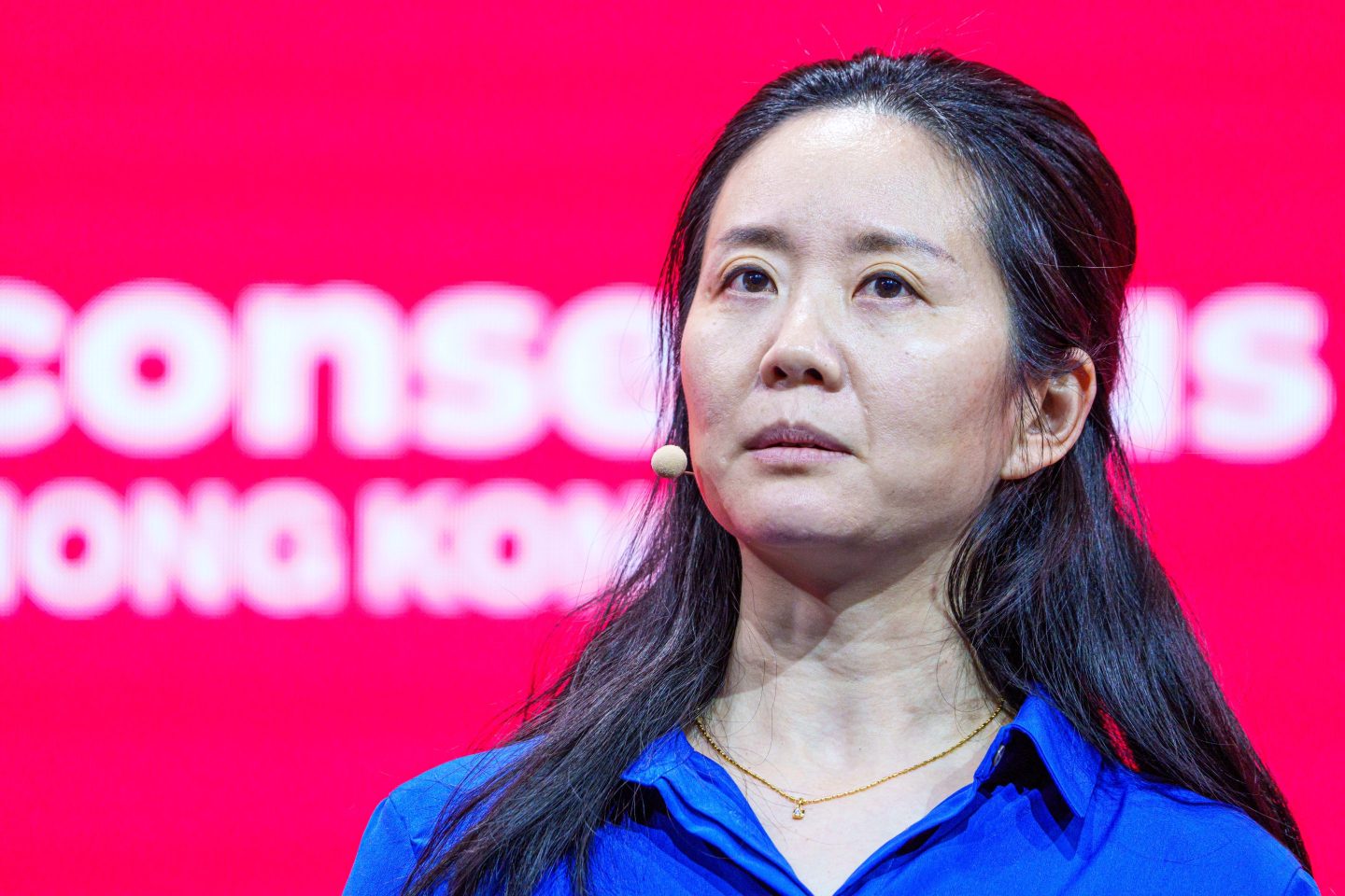 Hong Fang speaks during a recent crypto conference.