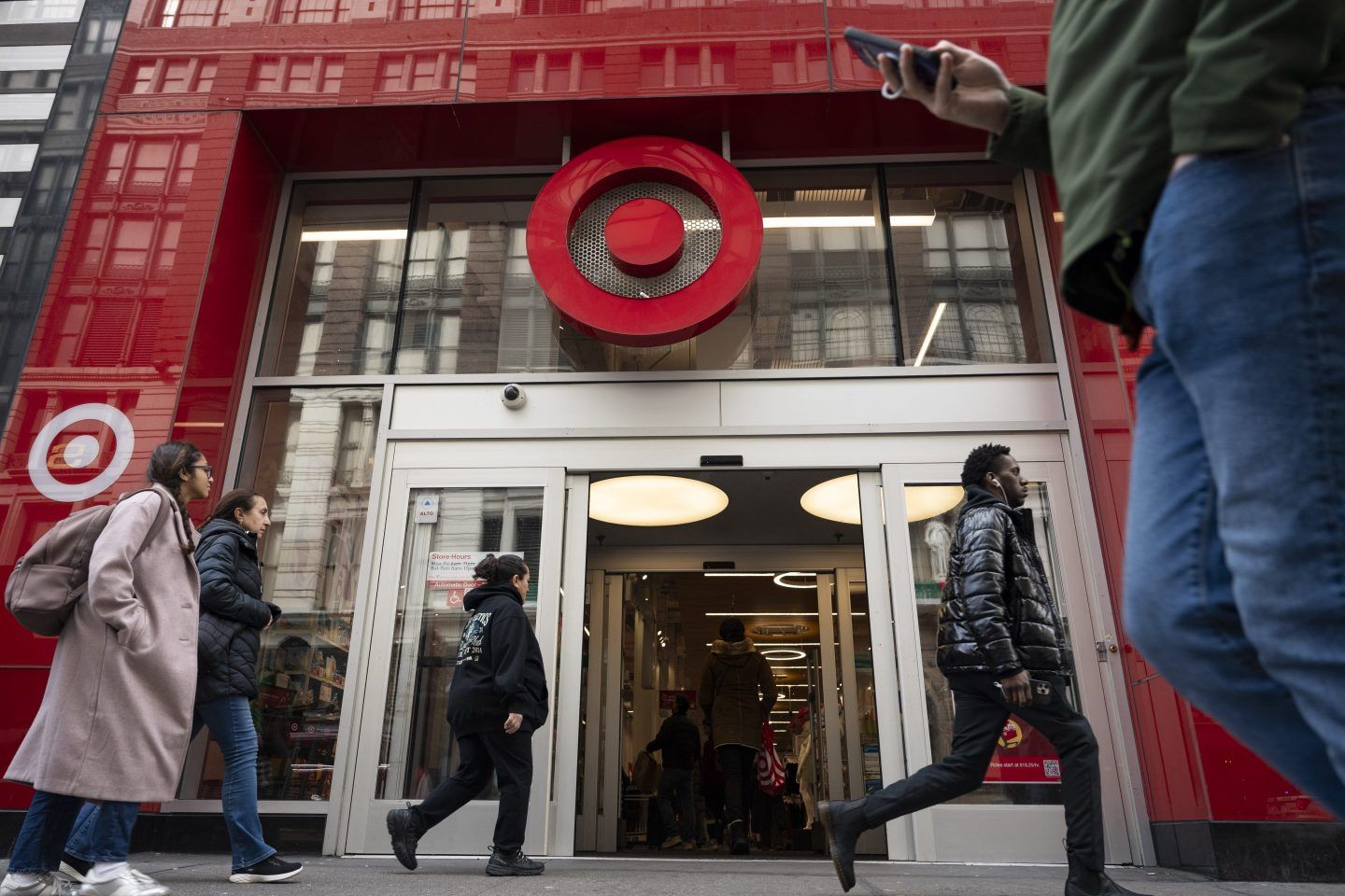 People walk past Target Store in Midtown Manhattan