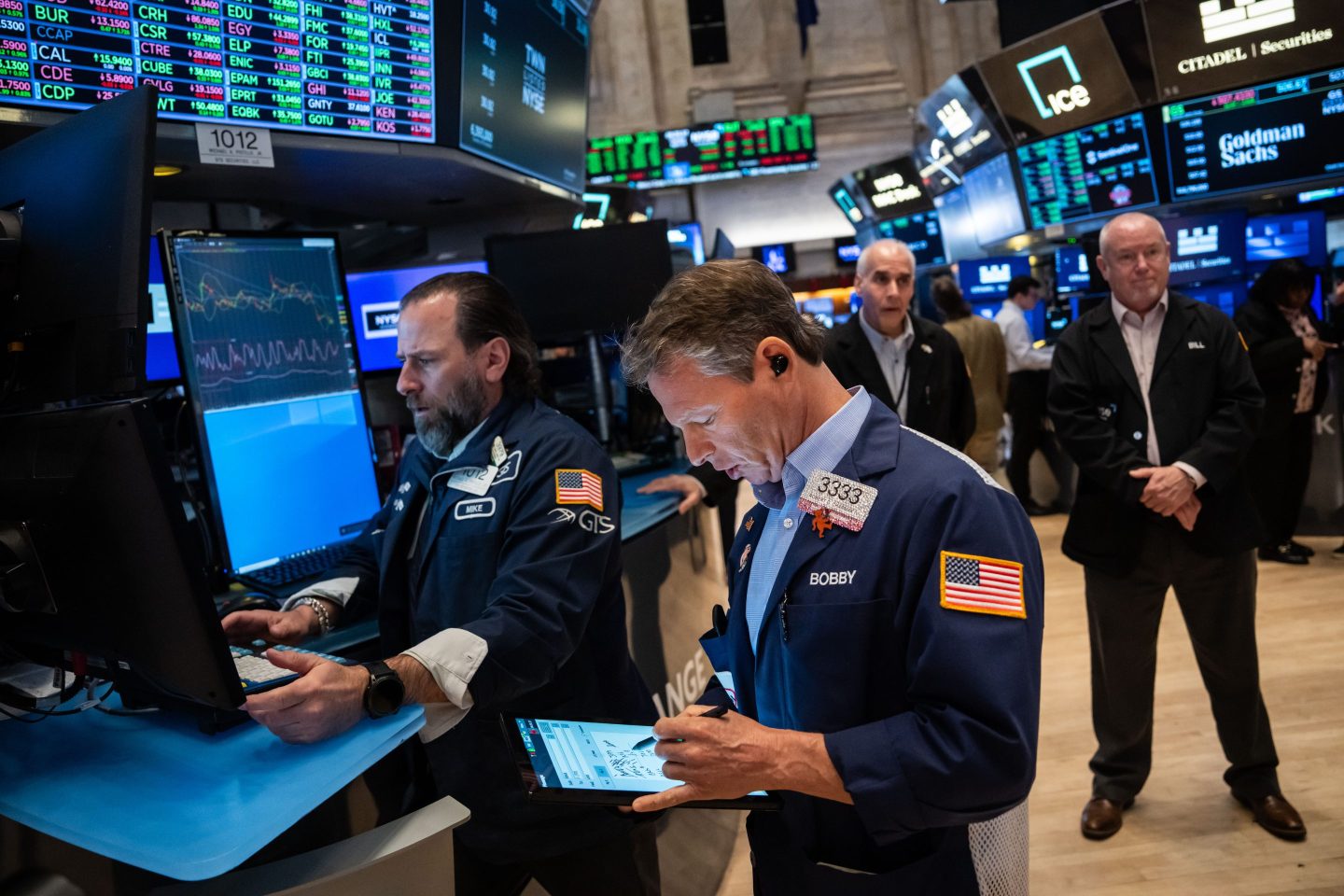 Traders work on the floor of the New York Stock Exchange.