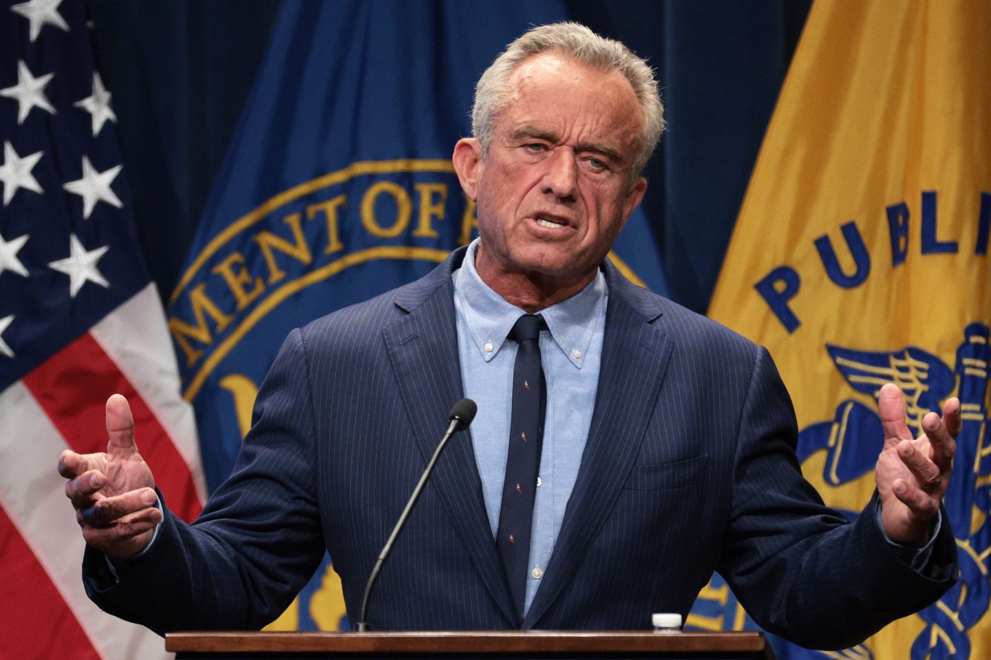 U.S. Secretary of Health and Human Services Robert F. Kennedy Jr. moves both hands as he speaks during a news conference at the Department of Health and Human Services on April 16, 2025 in Washington, DC.