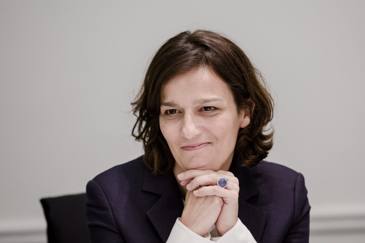 LVMH CFO Cecile Cabanis clasps her hands together