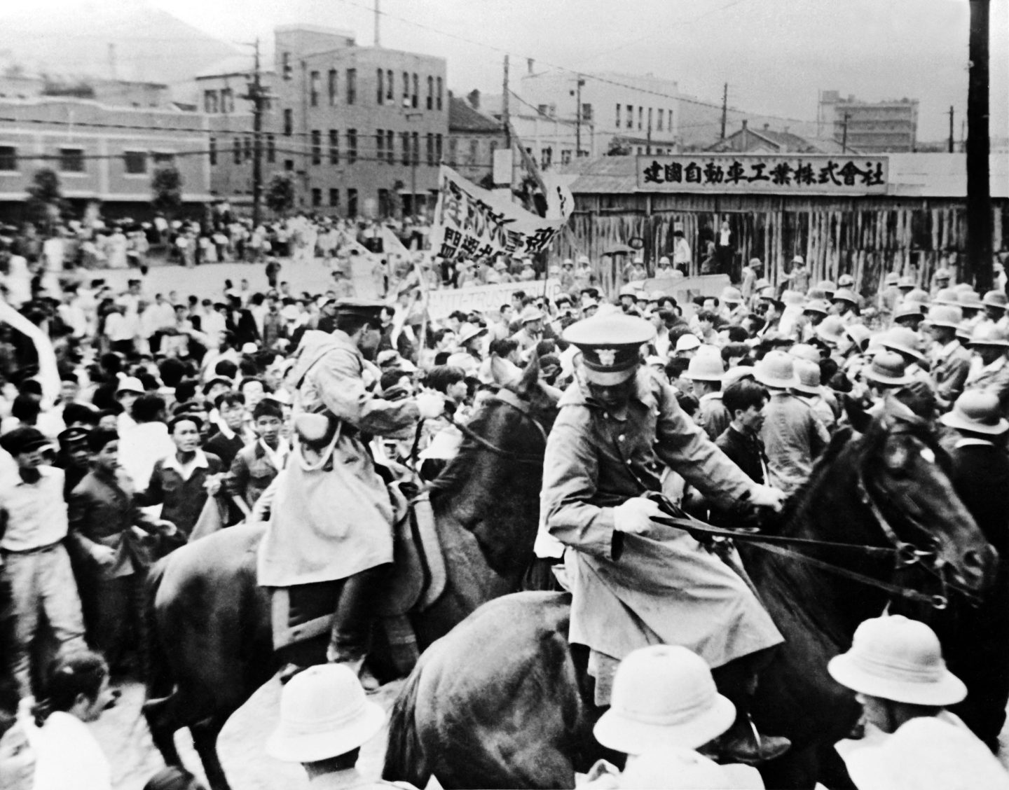 Police break up an anti-US and anti-Russian protest in Seoul in 1947.