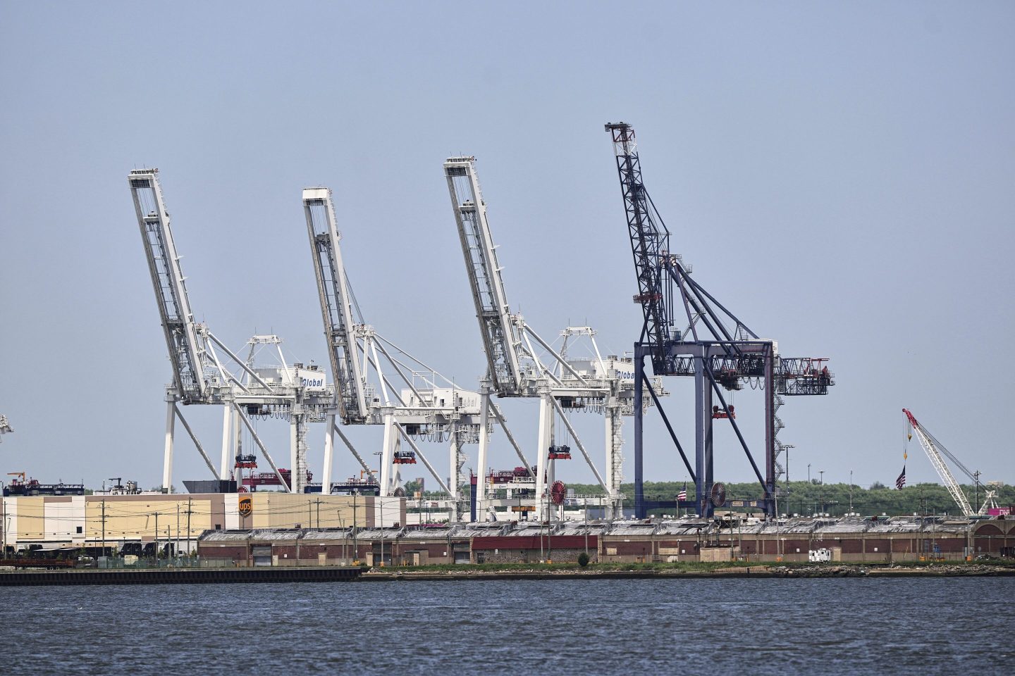 Container cranes sit idle at the port of the port of New York & New Jersey in Bayonne, N.J., on May 12, 2025.