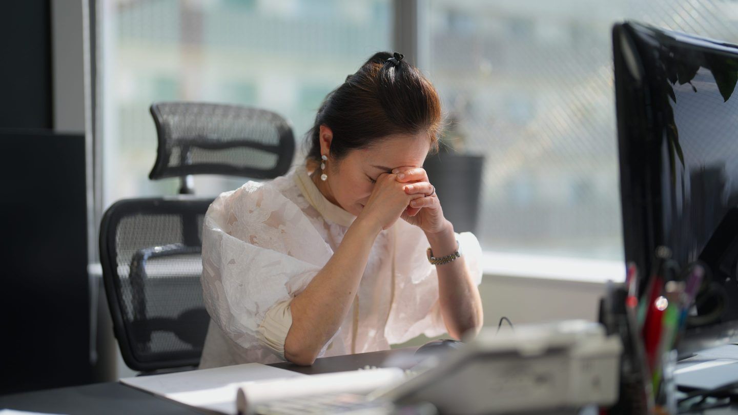 stressed worker at desk