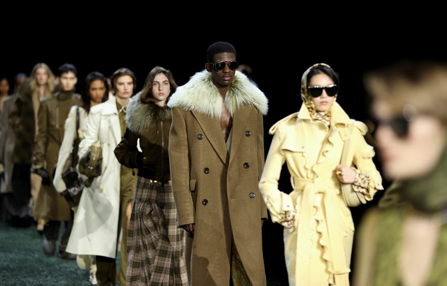 Models present creations at the Burberry catwalk show during London Fashion Week