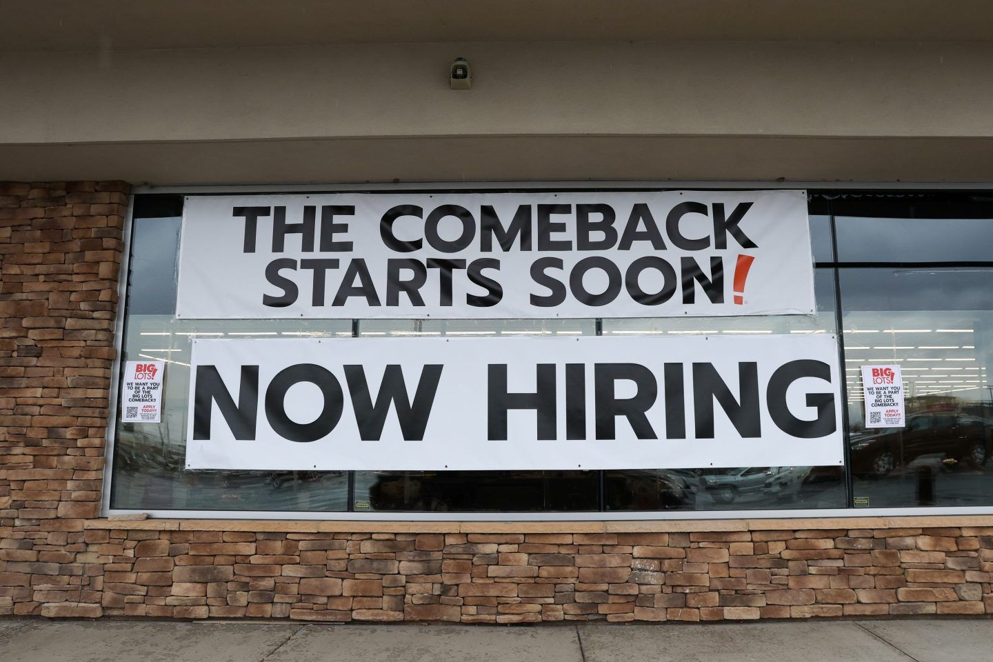 Sign reads: "The comeback starts soon! Now hiring"