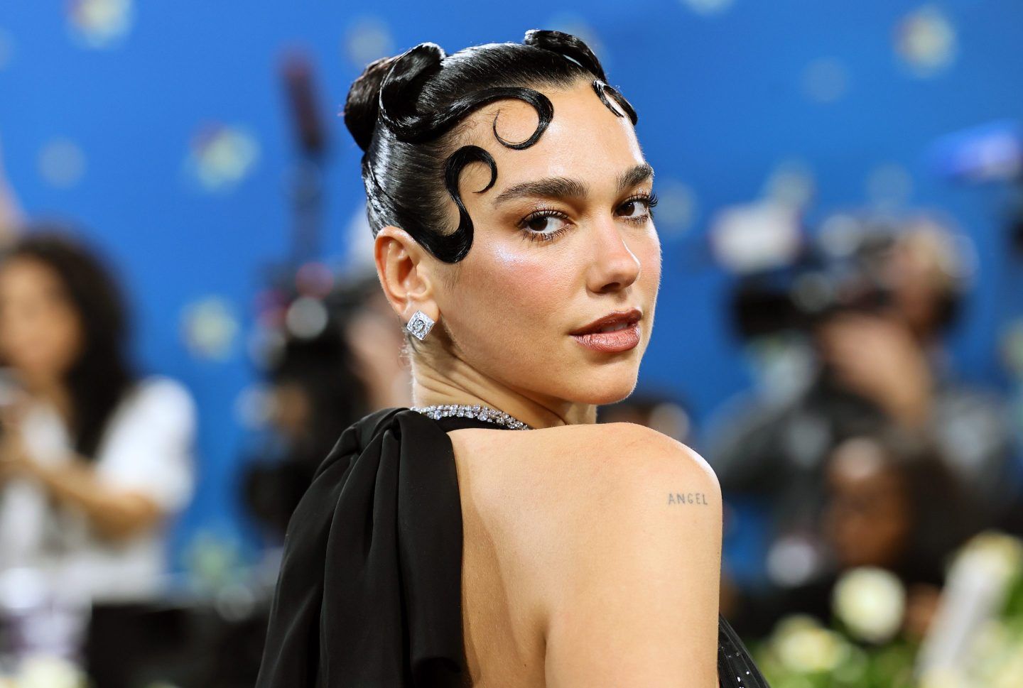 Artists like Dua Lipa see AI’s value but reject having their work used without consent.