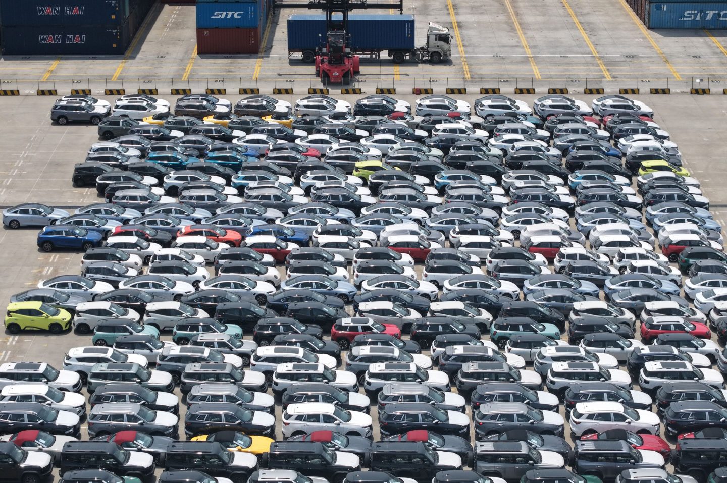 Dozens of cars waiting to be exported from China