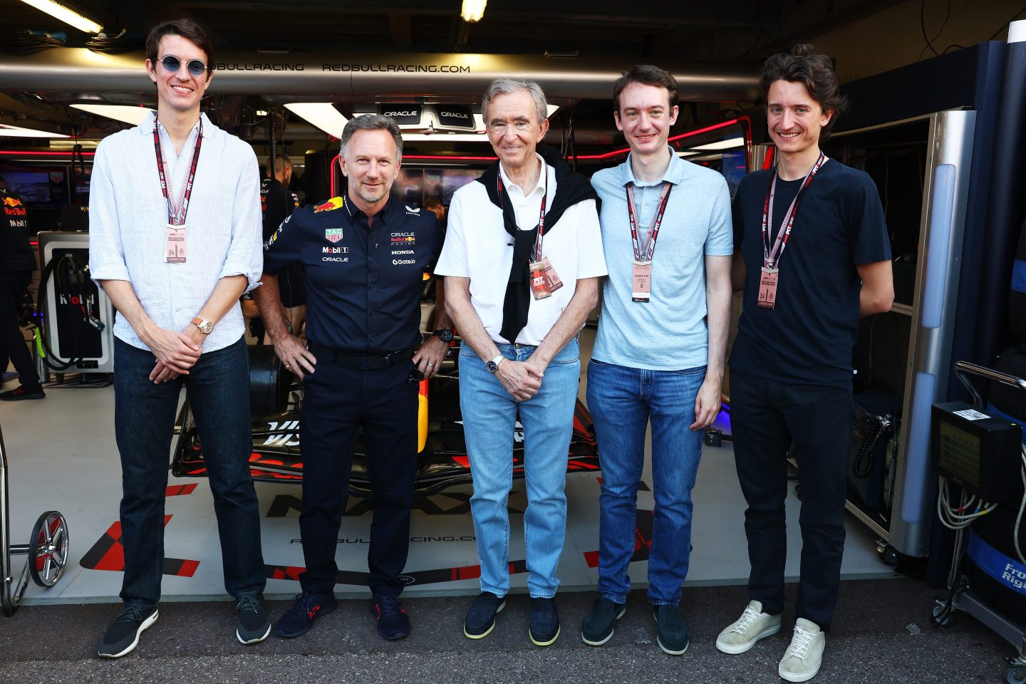 Christian Horner, Team Principal of Oracle Red Bull Racing with Bernard Arnault, CEO of LVMH and his sons Alexandre, Frederic, and Jean.