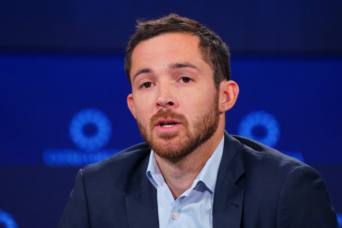 John Randal Tyson speaks on stage