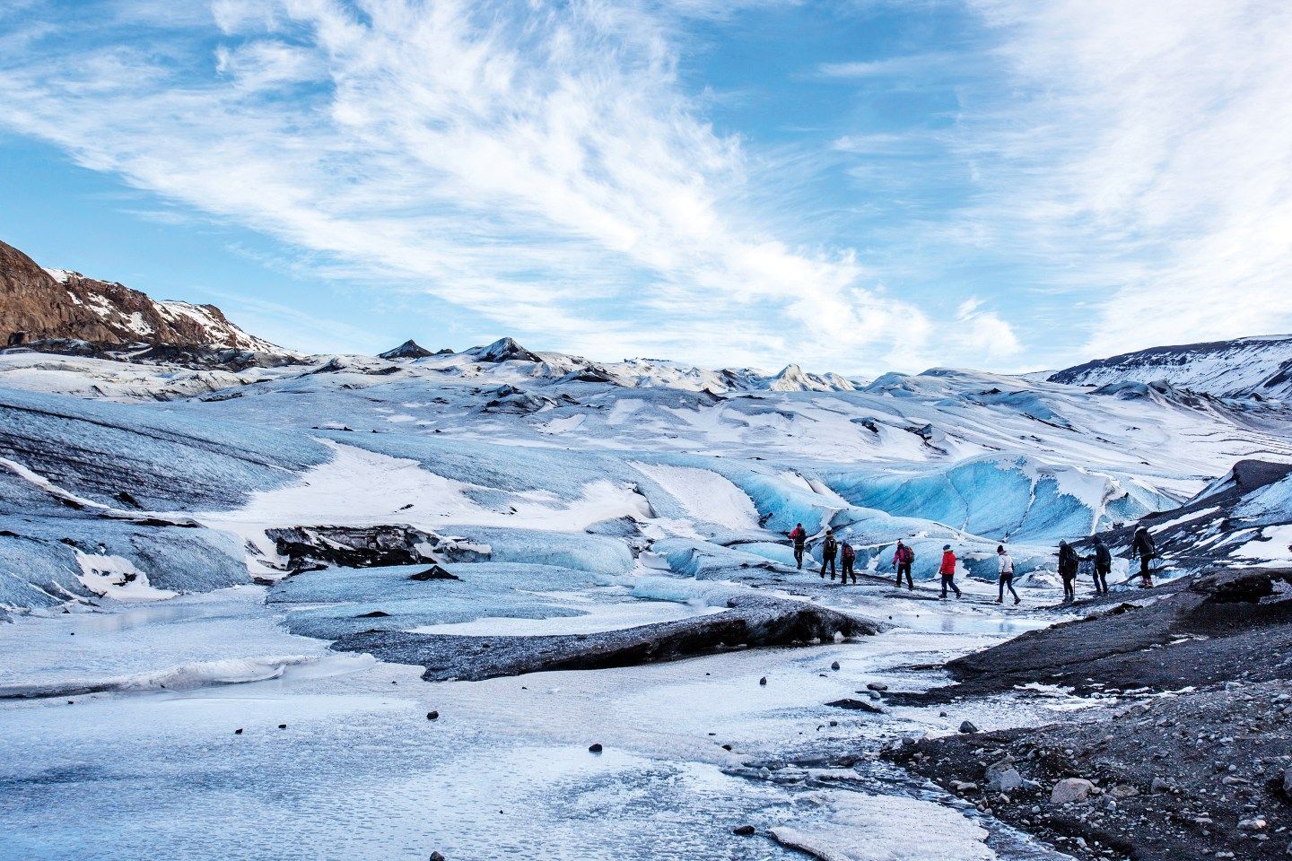 A hike up the volcanic-ash-streaked glacier Sólheimajökull.