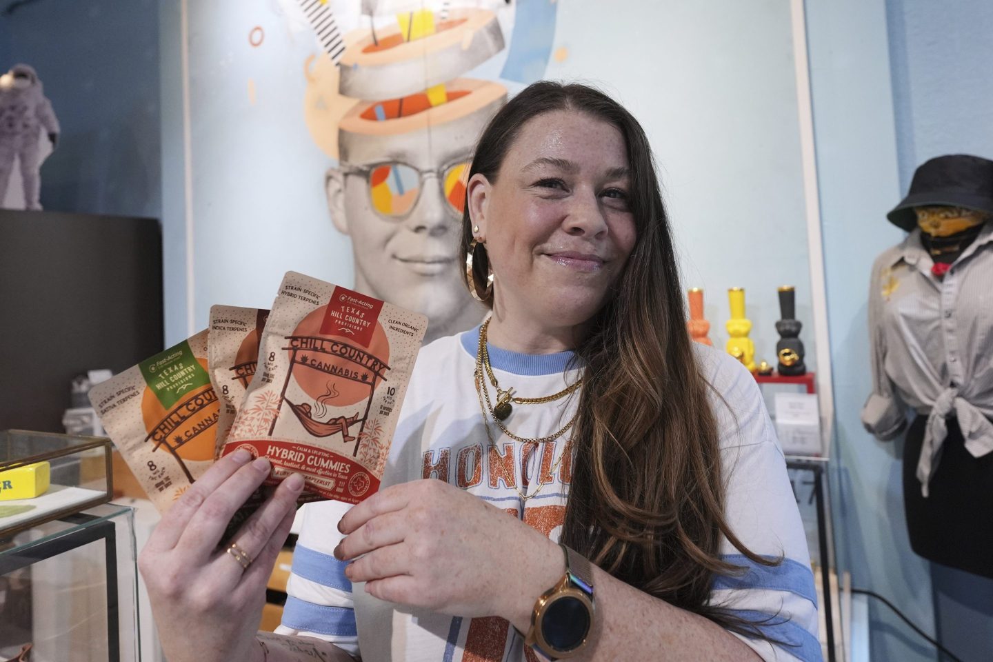 Employee Savannah Gavlik displays THC products at the Dope Daughters dispensary that Texas lawmakers were seeking to ban, on May 29, 2025, in Austin-