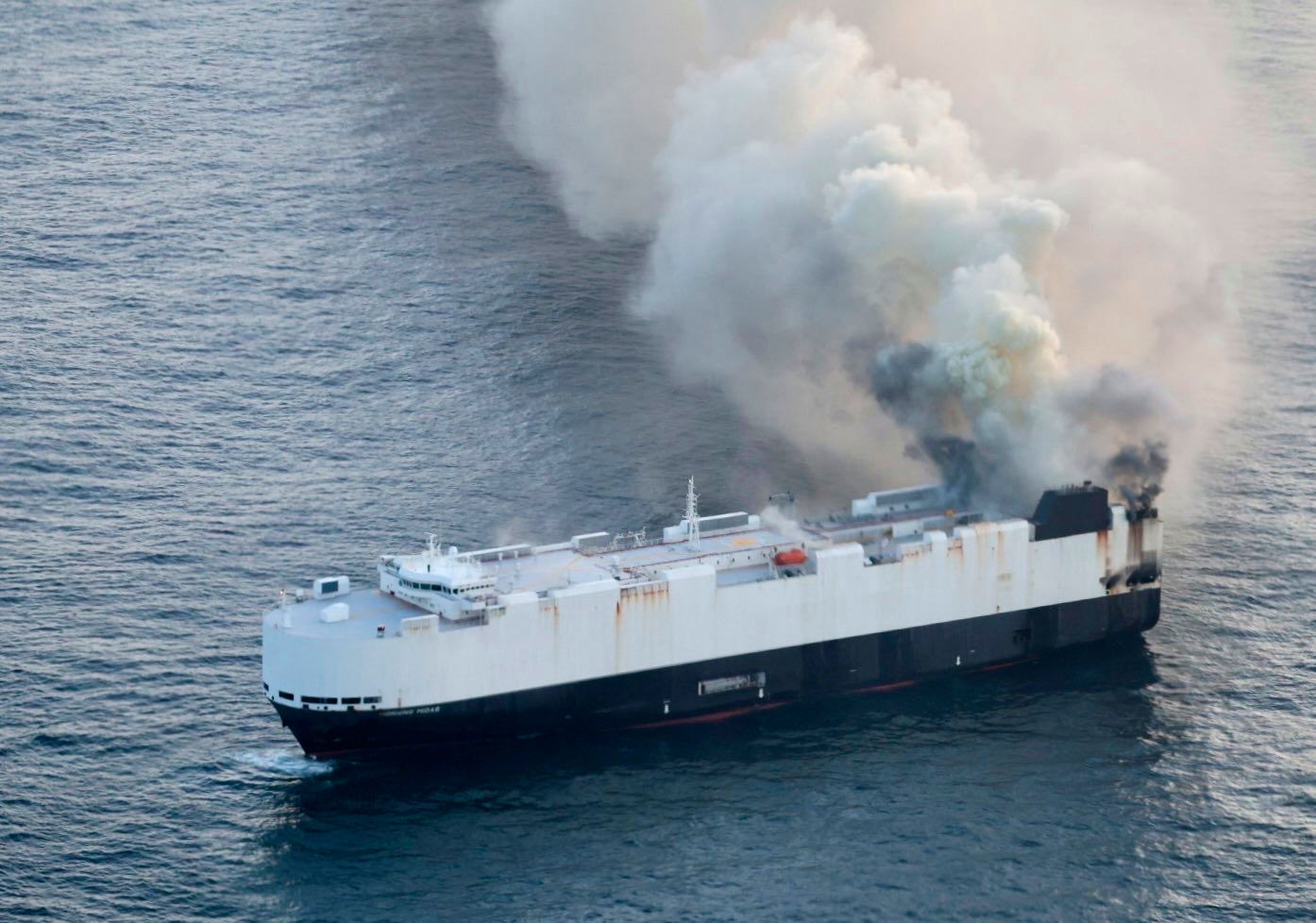 Smoke rises from cargo vessel Morning Midas approximately 300 miles south of Adak, Alaska, on June 3, 2025.