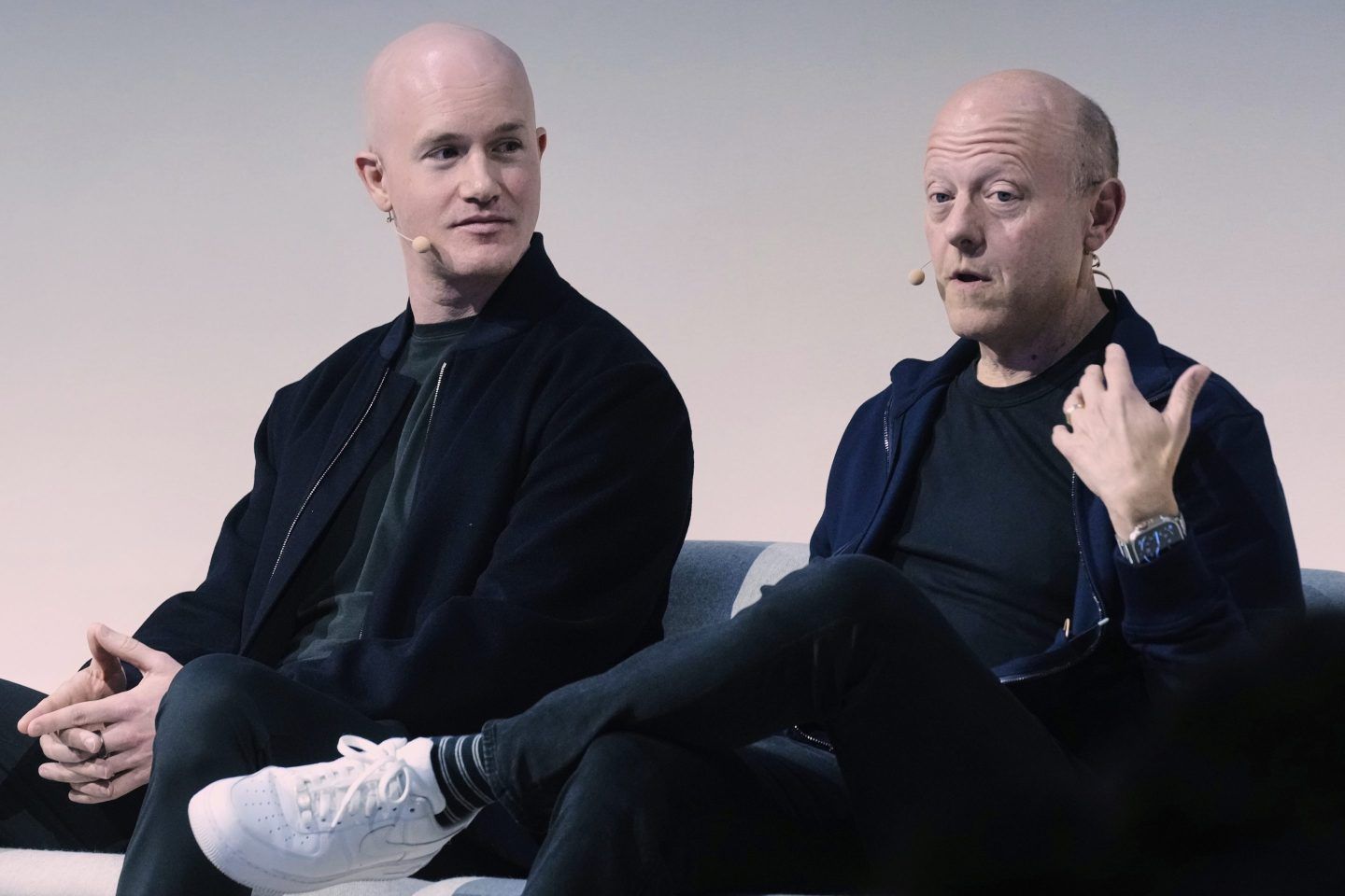Brian Armstrong, left, Co-founder and CEO of Coinbase, and Jeremy Allaire, Co-Founder, Chairman and CEO of Circle, participate in the State of Crypto Summit, in New York, on June 12, 2025. 
