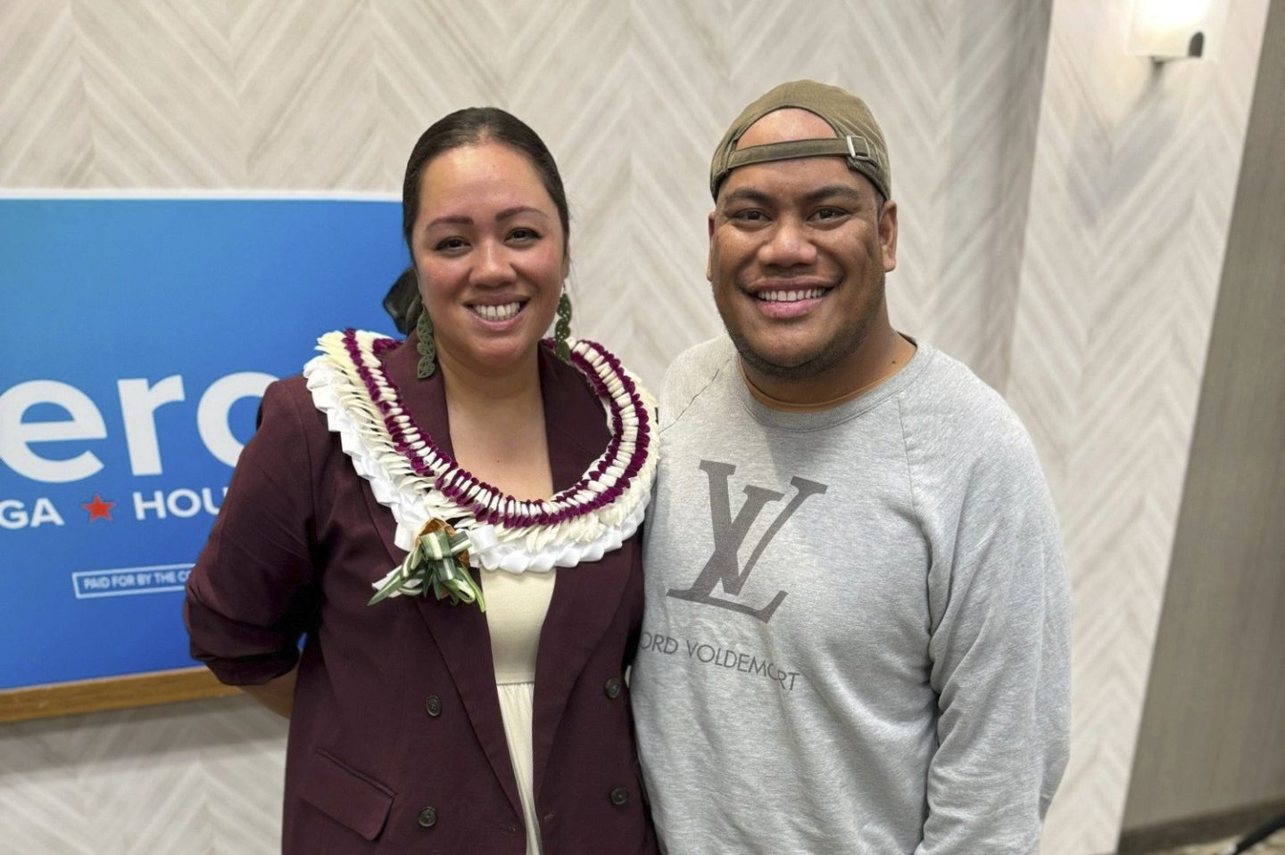 Utah State Rep. Verona Mauga stands next to Arthur Afa Ah Loo, who was shot and killed in the "No Kings" protest