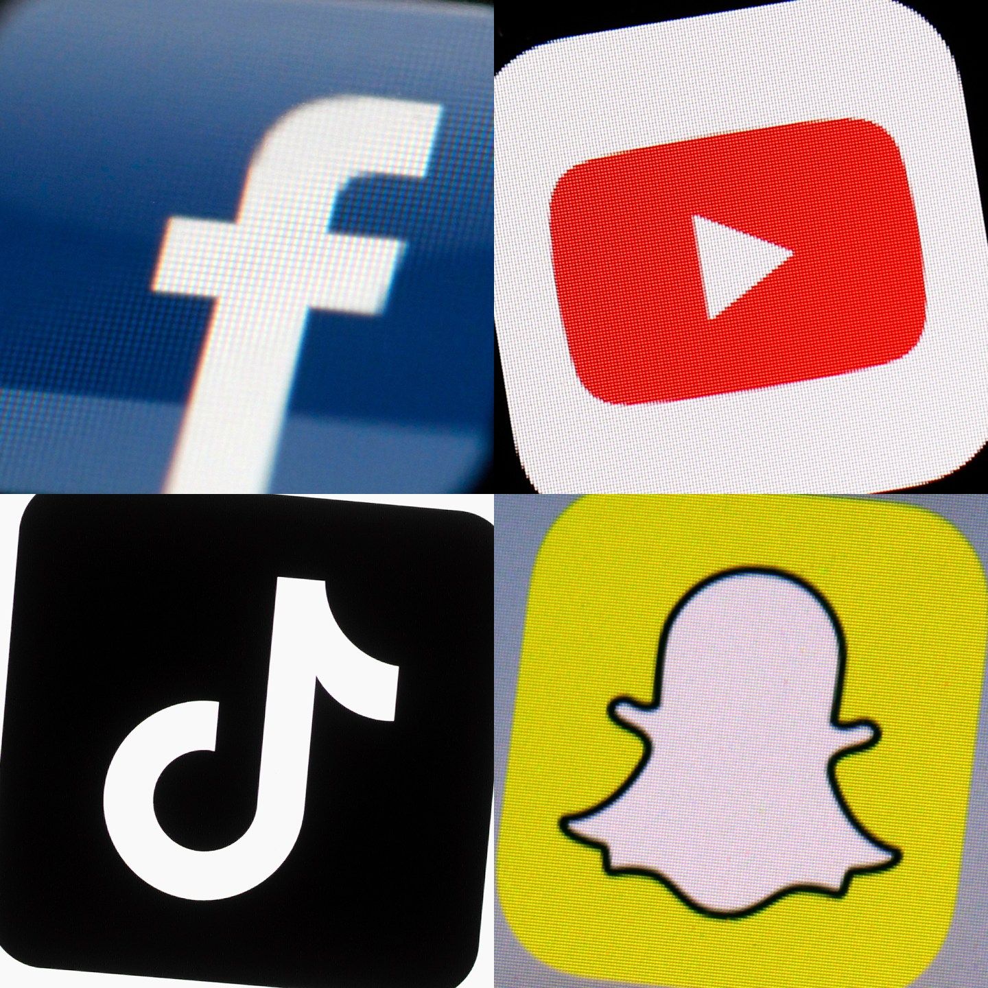 The logos of Facebook, YouTube, TikTok and Snapchat on mobile devices.