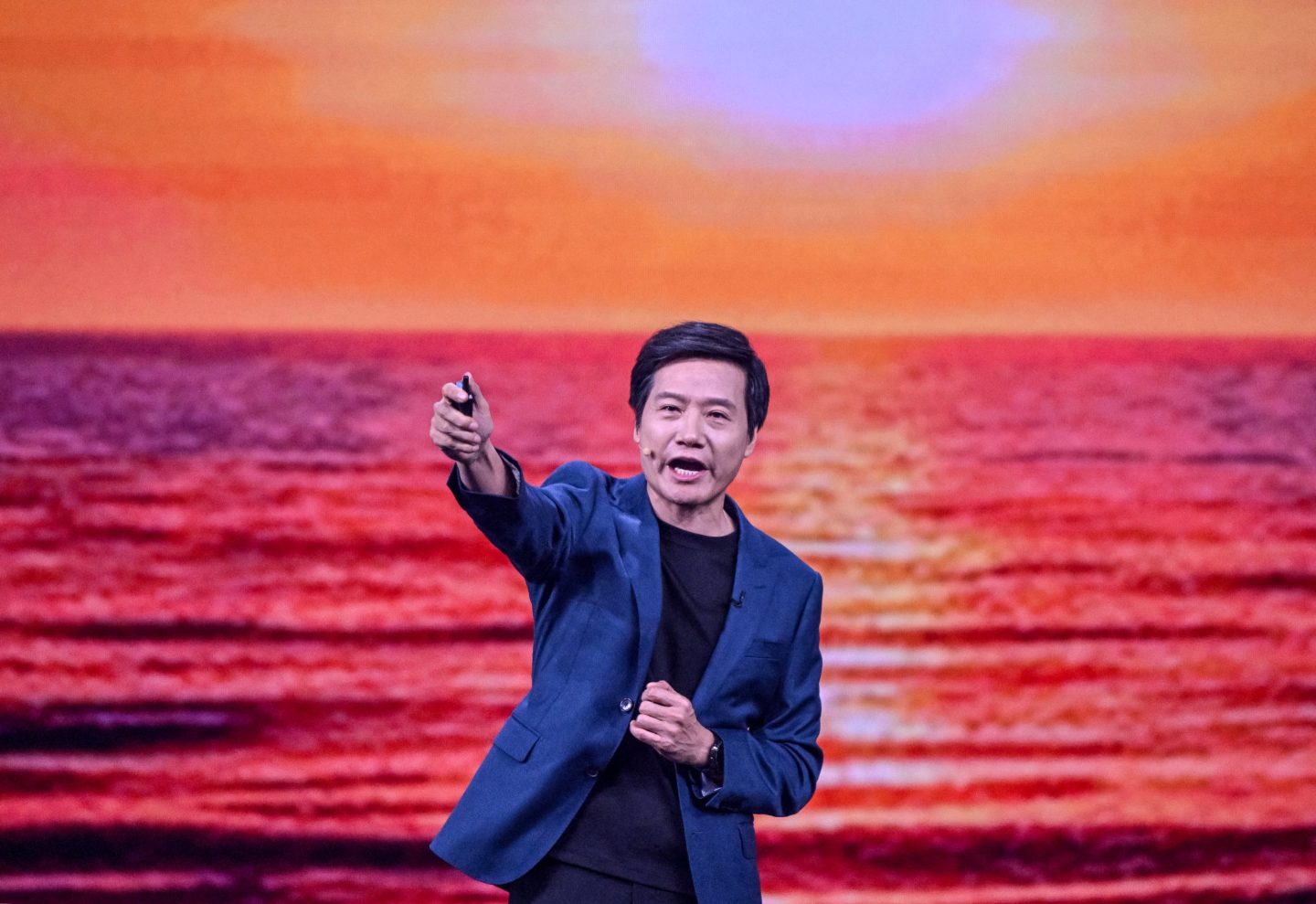 Lei Jun, CEO of Xiaomi, speaks during the launch of Xiaomi's XRING O1 chipset, mobile phone 15S Pro and Pad 7 Ultra in Beijing on May 22, 2025.