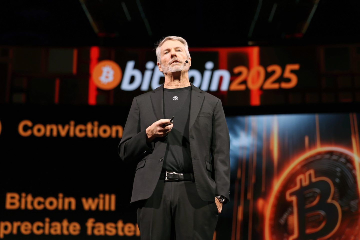 Michael Saylor speaks on stage at a May Bitcoin conference.