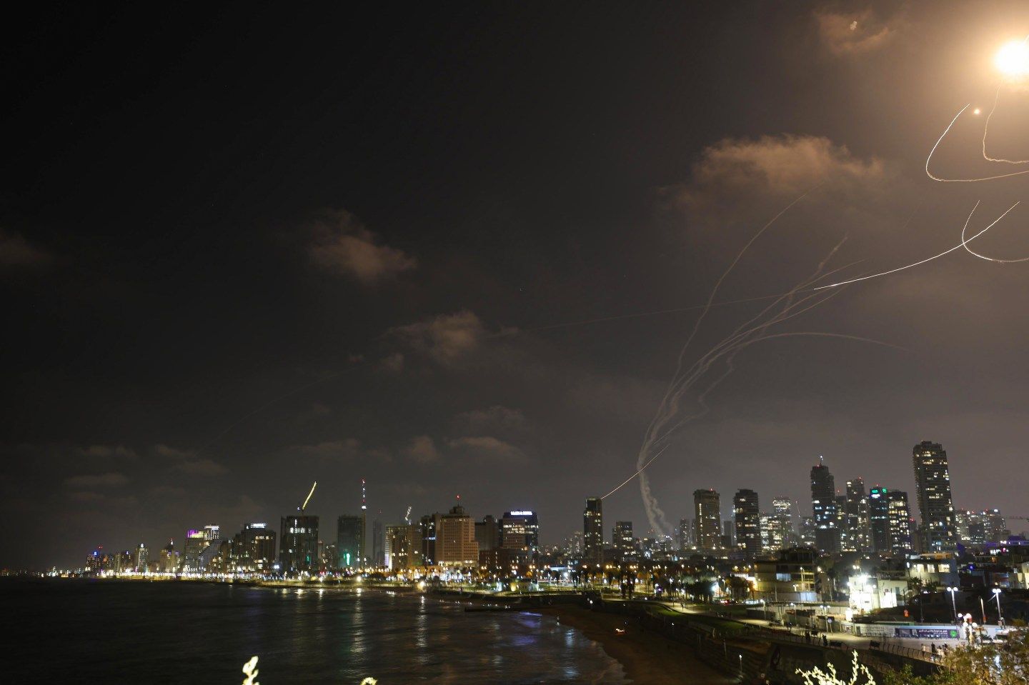 Smoke rises from residential areas in Tel Aviv after Iran launched a retaliatory attack on Friday.